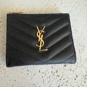 Black quilted wallet with all original packaging, dust bag, and authentication.